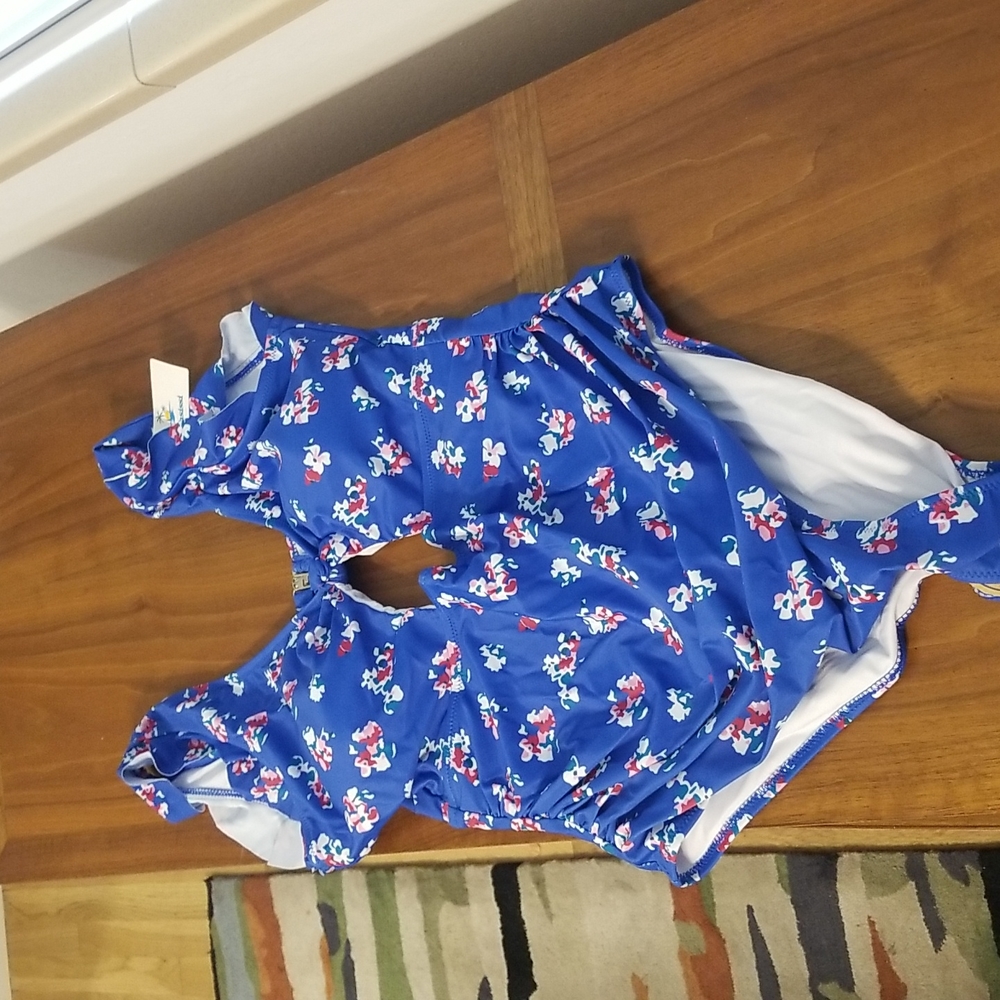 Brand new one piece bathing suit with keyhole and flutter sleeves